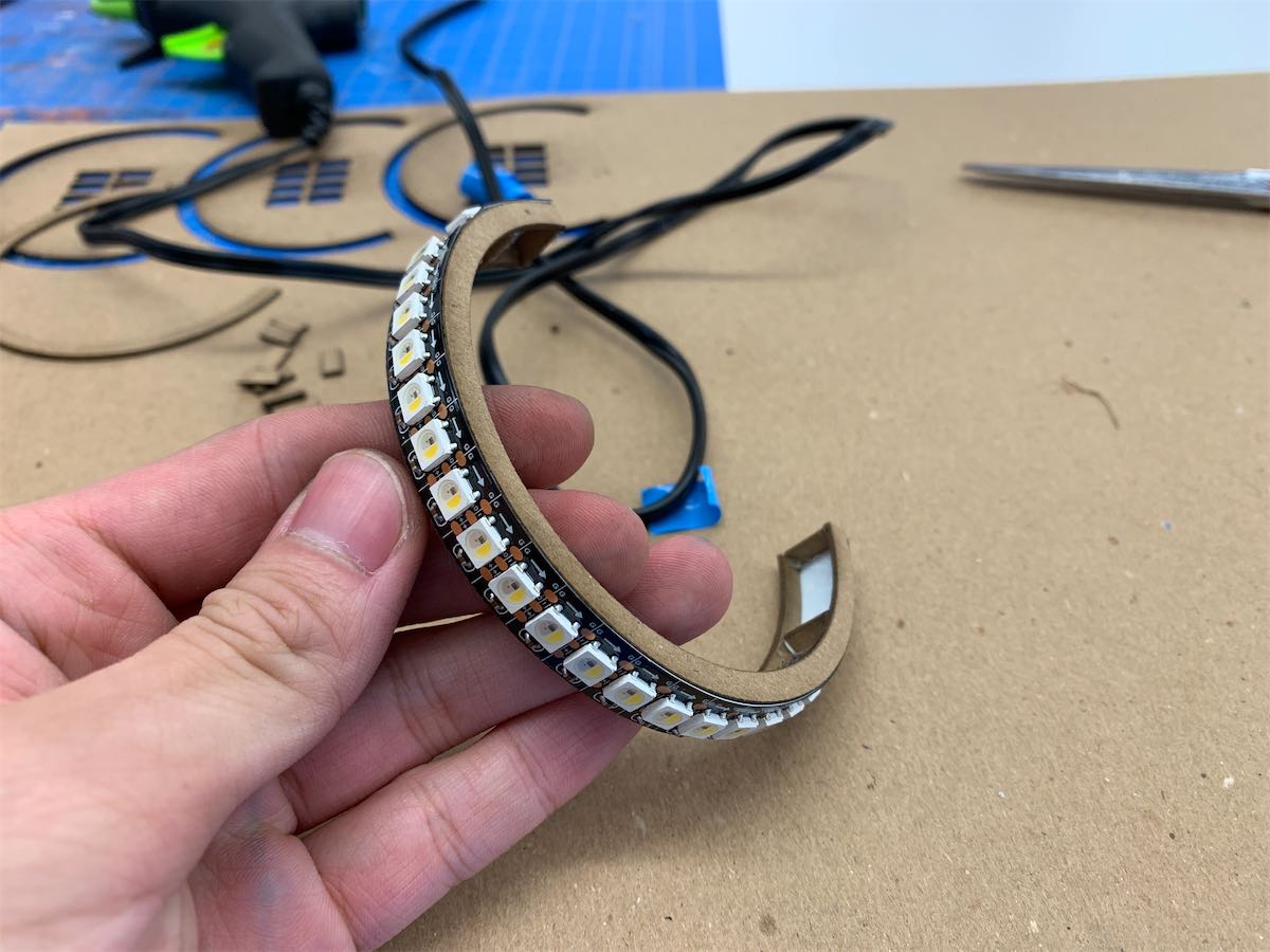 LED strip stick to a part-circle shape support